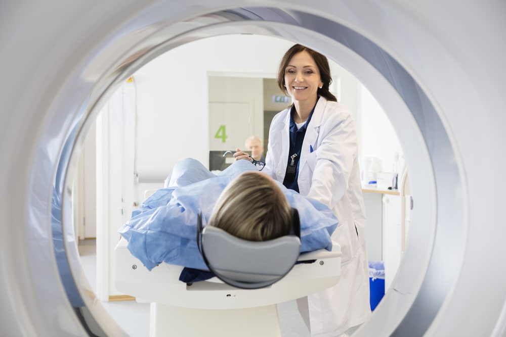Doctor with MRI and Patient