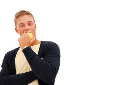 teenager eating apple