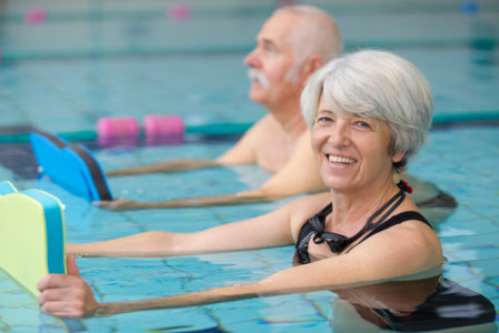 water aerobics man and woman