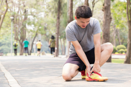 runner stopped sprained ankle