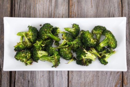 cooked broccoli on plate